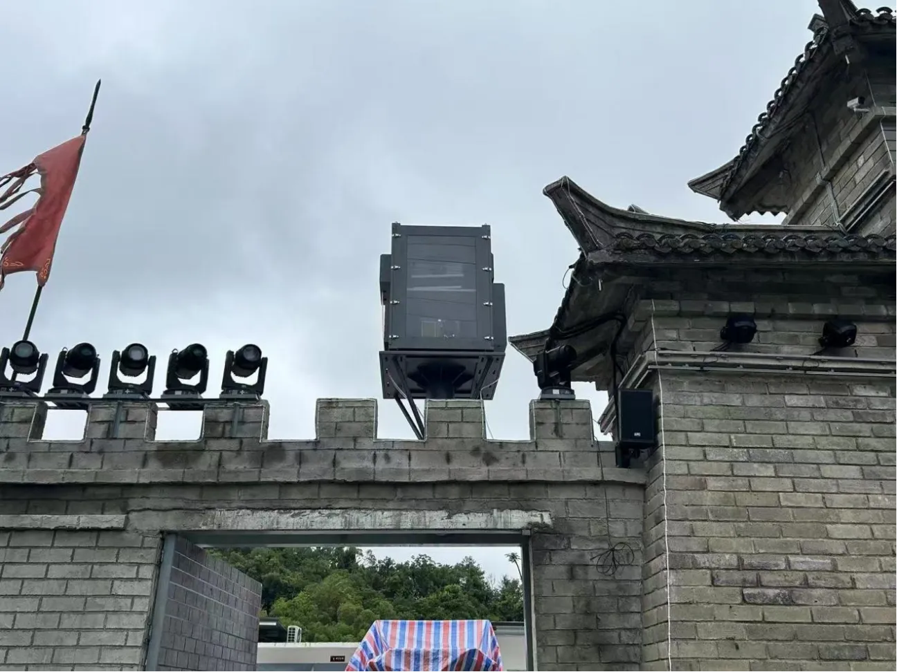 Air-conditioned outdoor projector enclosure for a 15,000-lumen dual-projector installation in Pingtan